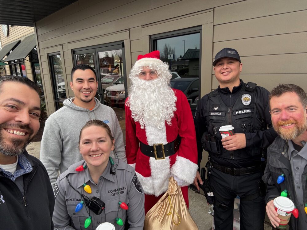 group coffee with cop santa outdoors